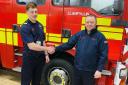 Josh Greer being promoted to crew manager at Llanfyllin Fire Station.