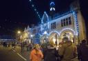 Crowds gather at the Christmas Light switch-on outside Llanidloes Town Hall.