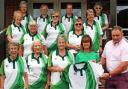 David and Nerys Lloyd of Unique Welsh Homes present Carno Bowling Club captain Margaret Rowlands with the new shirts.