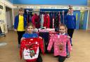 Cornelia, Amelia, Tallulah and Harvey are excited for Christmas Jumper Day 2021 at St Mary's Catholic Primary School, Newtown. Picture by Anwen Parry/County Times