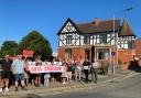 Residents and people concerned with a proposal to demolish Croesawdy in New Road gathered with their campaign banners and plaquards on Tuesday, August 9, 2022. Picture by Anwen Parry/County Times