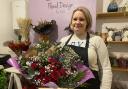 Hollie Hulme, owner of Hollie's Floral Designs, with a Valentine's Day bouquet at her florist shop in Llanidloes.