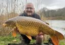 Jim Sharman with one of the carp he has caught