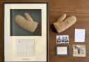Mittens worn by an Everest pioneer have been reunited after being sold at auction.