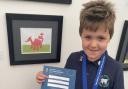 Huw Elias with his third place award from this year's Urdd Eisteddfod