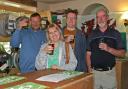 Richard Norris, Carol Woodhouse, Matthew Woodhouse and Ian Powell inside the Six Bells during the Bishop's Castle Real Ale Festival in 2017