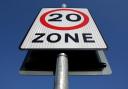 A 20mph speed limit sign.