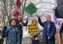 Treowen Primary School pupils gathered with their placards at a protest to save their school from closure.