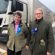 Conservative candidates Craig Williams and Owen Paterson in Llanymynech, discussing the Welsh Conservative commitment to building the Llanymynech-Pant bypass.