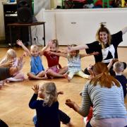 Impelo artistic director Jemma Thomas delivering a class to youngsters.