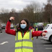 Grace Moucharafieh volunteering as a way-finder marshal at the Newtown Mass Vaccination Centre.