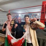 Owen Thomas (r) pictured with his dad Martin and fellow Llandrindod boxer Gareth Owen, who won the Welsh heavyweight title on Saturday