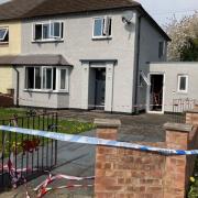 The house in Borfa Green, Welshpool, was cordened off by police