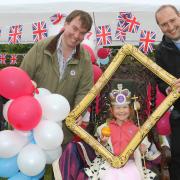 Welshpool Jubilee Carnival 2022.
Pictured is Craig Williams MP, daughter Amelia Williams and son Charlie Williams at the St Mary's Church Stall with the Rev Adam Pawley.
Picture by Phil Blagg Photography.
PB052-2022-8