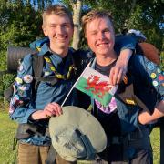 Swedish Scouts Ludvig Eriksson and Rickard Lindgren, both 18, and from Skovde in Sweden, arrive in Newtown, Powys during their Explorer Belt challenge from south to north Wales on Sunday, July 3, 2022. Picture by Anwen Parry