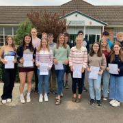 Students accepting their results at Welshpool High Scoool