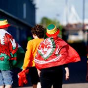 Cardiff fans arrive ahead of the UEFA Nations League match at Cardiff City Stadium, Cardiff. Picture date: Saturday June 11, 2022.