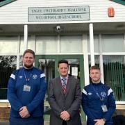Shrewsbury Town College and University Education Manager Calvin latham and Education Mentor John Fletcher with Welshpool High School Headteacher Jon Arnold.