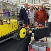Charlie Ross with Cloverlands Model Car Museum trustees Max Tomlinson, Bruce Lawson and John Nunn.