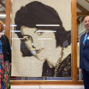 Laura Ashley Vice President Poppy Marshall Lawton, who is leading the brand's revival, unveiled an American-made quilt of the Welsh-born fashion designer alongside the High Sheriff of Powys Tom Jones at Newtown Library on International Women's Day.