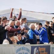 Kerry supporters celebrate their side's win at Barmouth United on Saturday. Picture by Dominic Vacher.