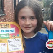 Gweni Roberts, 11, will embark on her first ever 10K run for two local causes.