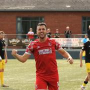 Aaron Williams celebrates his hat-trick against Caernarfon Town. Picture by Dave Evans.