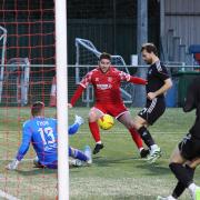 Action from Newtown's clash with Connah's Quay Nomads. Picture by Dave Evans.