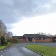 The former Bronllys primary school building is set to be demolished - but an application to turn the playing field into a village green has yet to be decided. From Google Streetview.