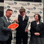 Duncan Borthwick of llanymynech Village Shop accepting an award at the 2024 Countryside Alliance Awards.