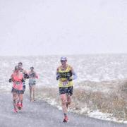 Runners battled a blizzard at the race's highest point, approaching the Elan Valley. Pic Emma Hardwick.
