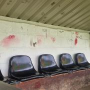 Graffiti has been daubed on the back of the stand by vandals.