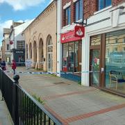 A police cordon has blocked off the Santander bank in Newtown.