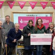 Llanfyllin Shed and Montgomeryshire Wildlife Trust receive a cheque for £10,000 in National Lottery Funding.
