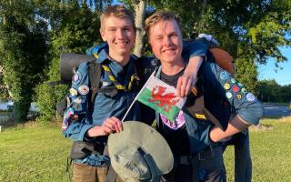 Swedish Scouts Ludvig Eriksson and Rickard Lindgren, both 18, and from Skovde in Sweden, arrive in Newtown, Powys during their Explorer Belt challenge from south to north Wales on Sunday, July 3, 2022. Picture by Anwen Parry