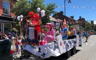An Alice in Wonderland float at Llanidloes Carnival 2022.