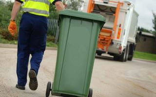 Bin collections have been delayed for weeks in the north of Powys.