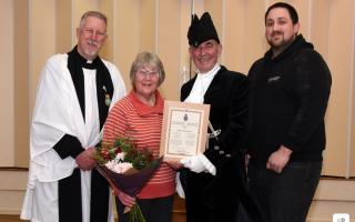 Sue Davies is pictured with (l-r) Rev Andrew Perrin, Powys High Sheriff Reg Cawthorne and Gwyn Powell.