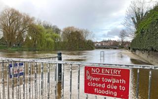 A closed path sign in River Severn, Shrewsbury on Friday, March 15, 2024 (Mike Sheridan/LDRS)