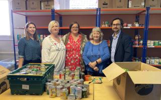 Our Communities Together has supported Raven House Trust. L-R, Community Foundation Wales' Katy Hales, Raven House Trust foodbank coordinator Samantha Harrhy, finance manager Becca Jevons, volunteer Gill Passey and Newsquest's Gavin Thompson