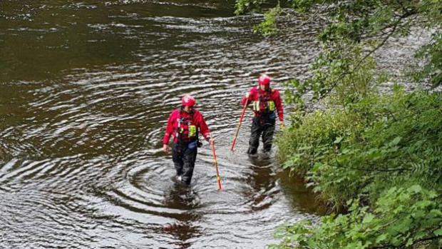Brecon Mountain Rescue river search teams scour the River Wye.
