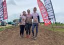 Eleanor Langford, Lowri Griffiths, and Natasha Rowe  after completing their 5k mud run.