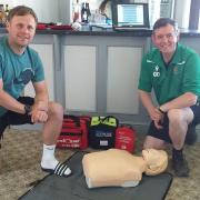 Mathew Savage of DM PROcoach with a members of Llanidloes Cricket Club at the first aid pre-match session.