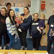 Aimee Griffiths, Sarah Edwards, Sami Vaughan, Naomi Jones and babies Lucy and Mia, Sophie Yates (Powys County Council) and presenters Kate Williams (PTHB) and Mark Cahill (Powys County Council) at the Eat Smart, Save Better workshop at Maesyrhandir