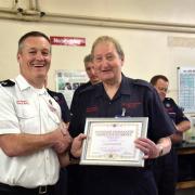 Firefighter Brian Hamer with Assistant Chief Fire Officer Craig Flannery.