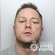 Daniel Meades, 38, was jailed for 12 months for dangerous driving and criminal damage.