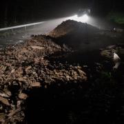 The debris after flash flooding has left the A483 closed this morning