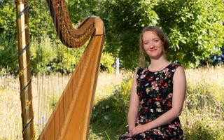 Alis Huws with the Royal Harp.