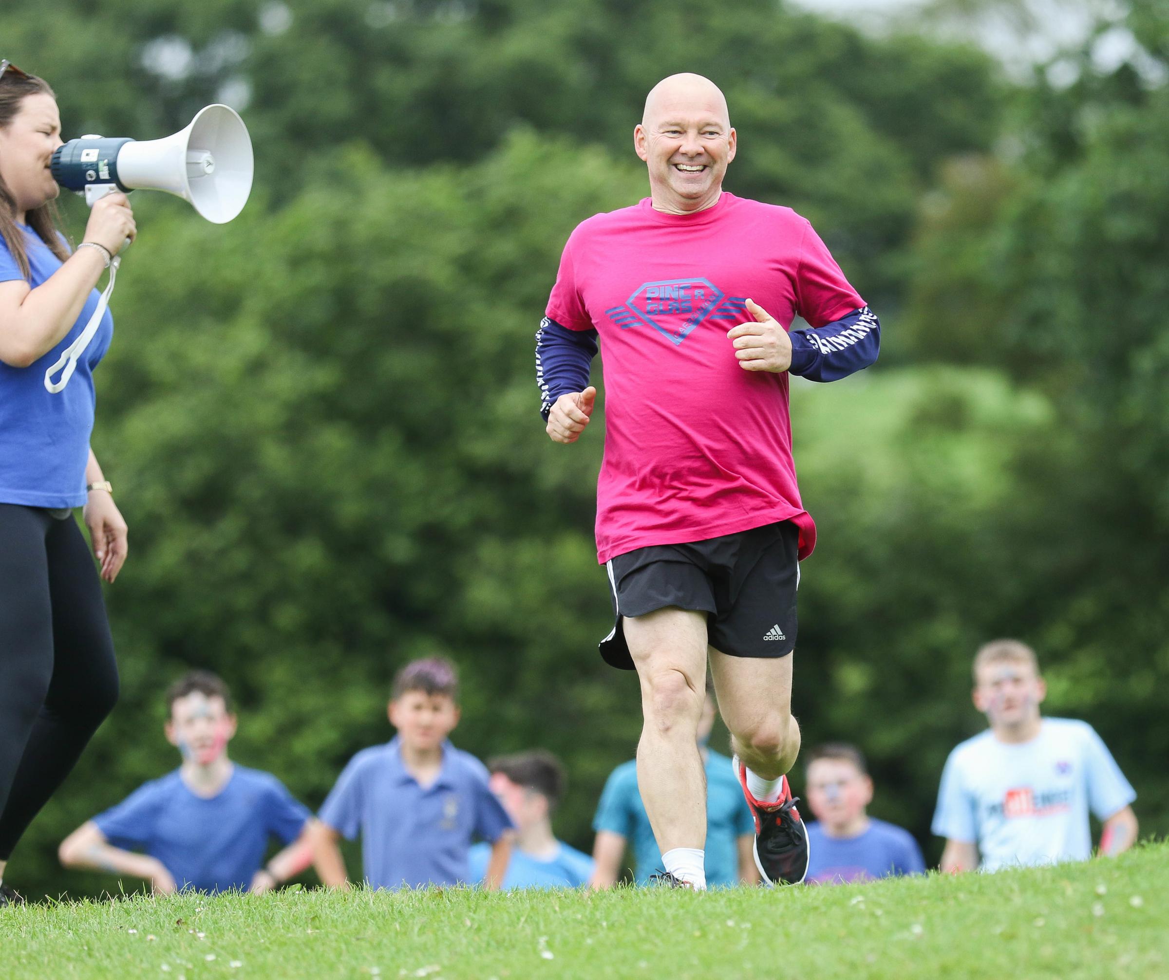 Caereinion High School pupils and staff took part in the Race For Life - Race at your Place event at the High School last Tuesday 9th July..Pictured is Headteacher Phil Jones..Picture by Phil Blagg..PB328-2019-34.