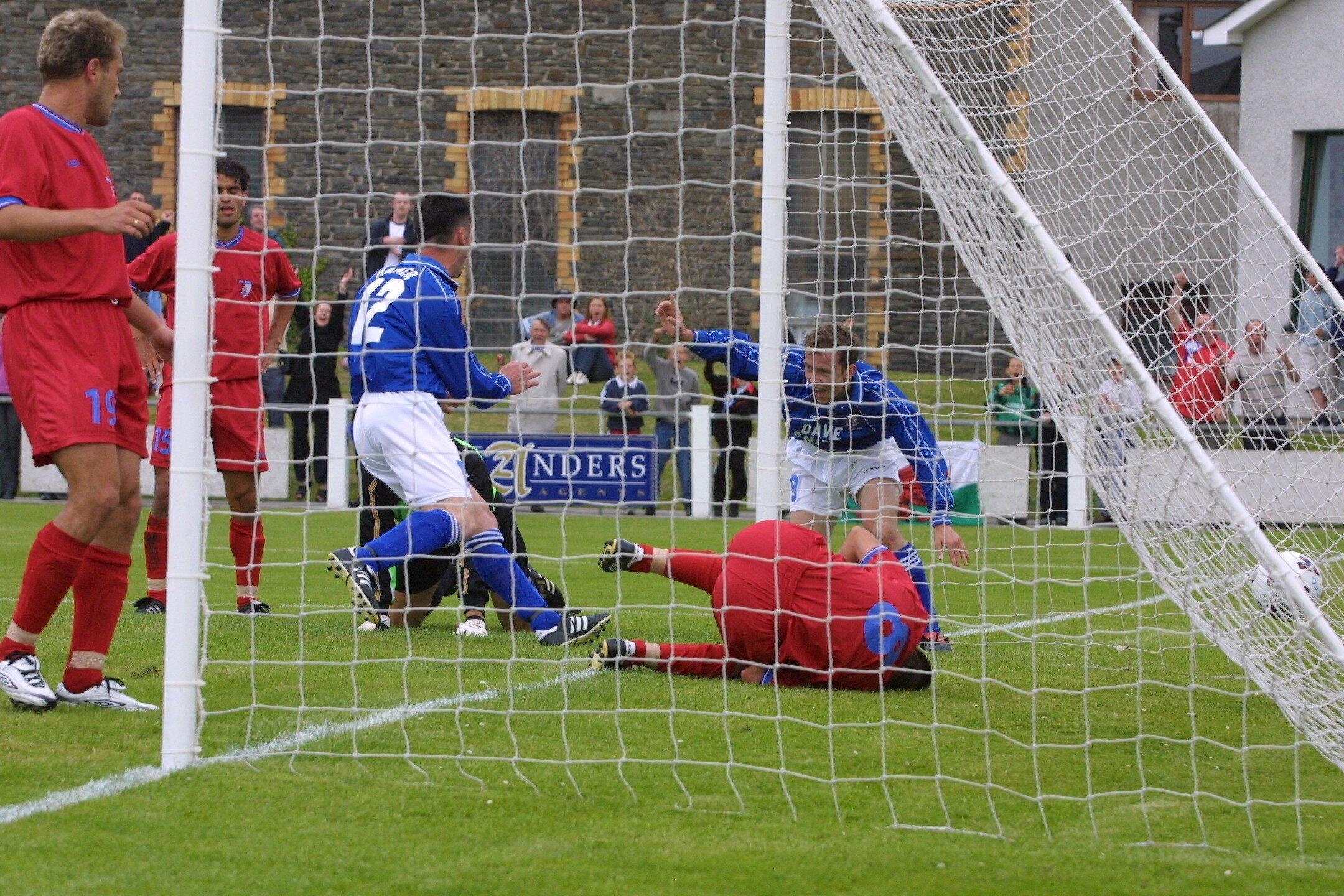 Graham Evans scores for Caersws against PFC Marek in the Inter Toto Cup. Pic by Phil Blagg